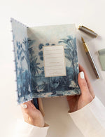 Load image into Gallery viewer, 2025 Day To A Page Linen Bound Planner - Blue Plaid
